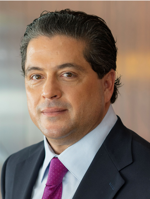 Mark E. Manigan